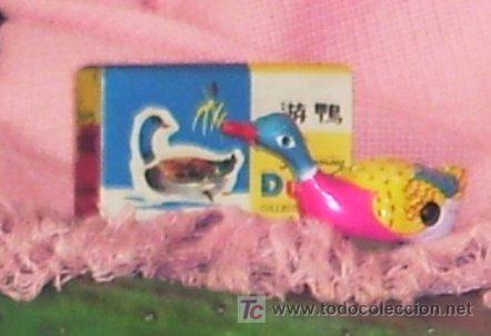 Juguetes antiguos de hojalata: Pato nadador - Foto 1