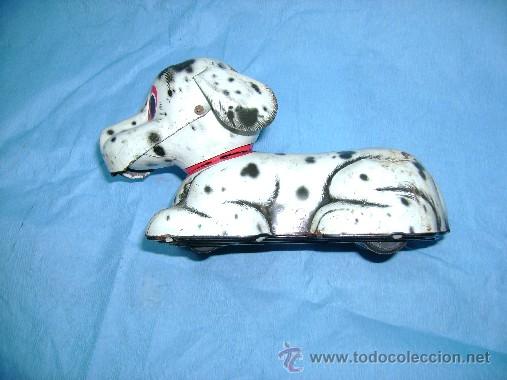 Juguetes antiguos de hojalata: PERRO DE LATA DE FRICCION - Foto 2