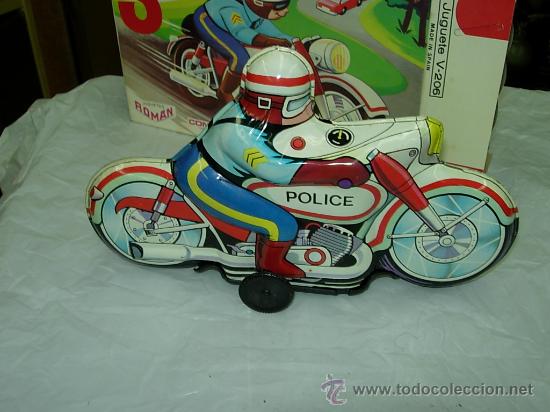 Juguetes antiguos de hojalata: motorista de roman - Foto 3