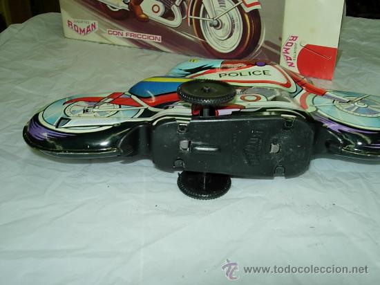 Juguetes antiguos de hojalata: motorista de roman - Foto 2