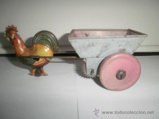 Juguetes antiguos de hojalata: GALLINA CON CARRETA - Foto 2