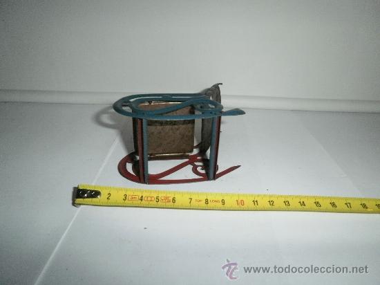 Juguetes antiguos de hojalata: PRECIOSA MECEDORA DE RICO   EN - Foto 3