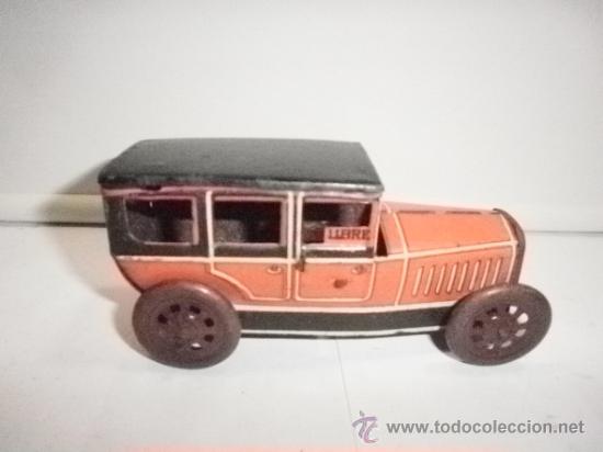 Juguetes antiguos de hojalata: TAXI DE RICO - Foto 1