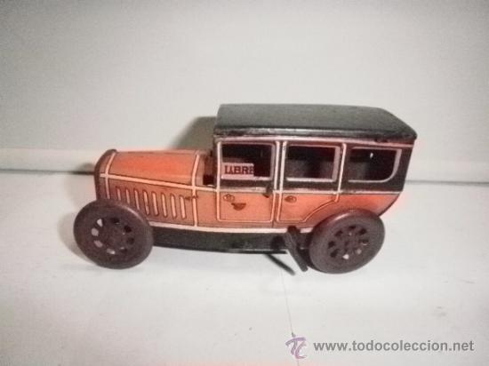 Juguetes antiguos de hojalata: TAXI DE RICO - Foto 2