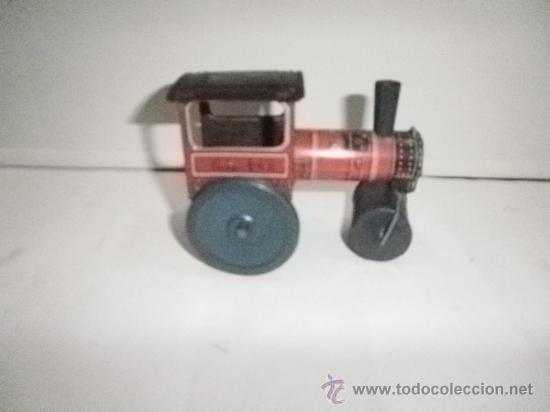 Juguetes antiguos de hojalata: APISONADORA DE RICO - Foto 1