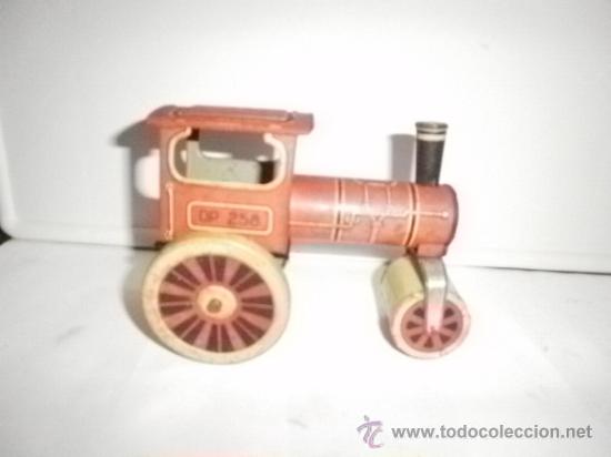 Juguetes antiguos de hojalata: APISONADORA DE RICO - Foto 1