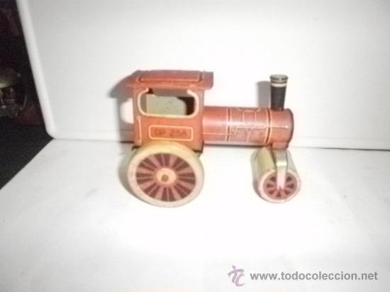 Juguetes antiguos de hojalata: APISONADORA DE RICO - Foto 2