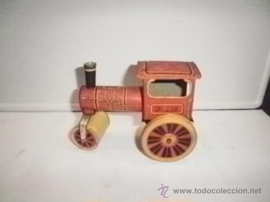 Juguetes antiguos de hojalata: APISONADORA DE RICO - Foto 3