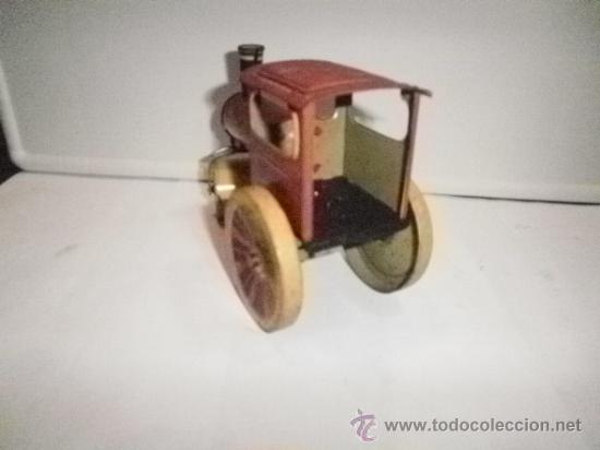 Juguetes antiguos de hojalata: APISONADORA DE RICO - Foto 4