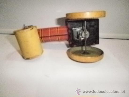 Juguetes antiguos de hojalata: APISONADORA DE RICO - Foto 5
