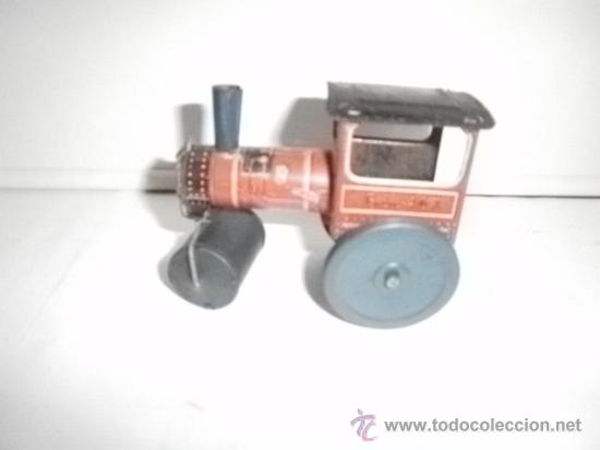 Juguetes antiguos de hojalata: APISONADORA DE RICO - Foto 2