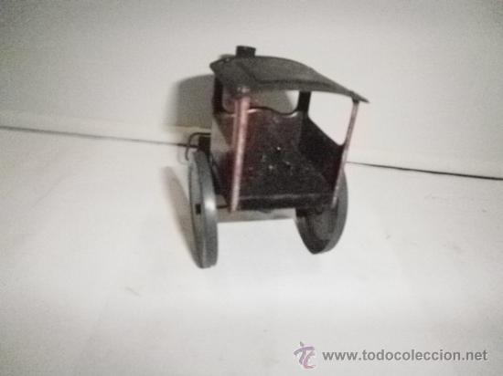 Juguetes antiguos de hojalata: APISONADORA DE RICO - Foto 3