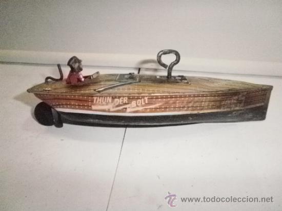 Juguetes antiguos de hojalata: LANCHA CON PERSONAJE - Foto 1
