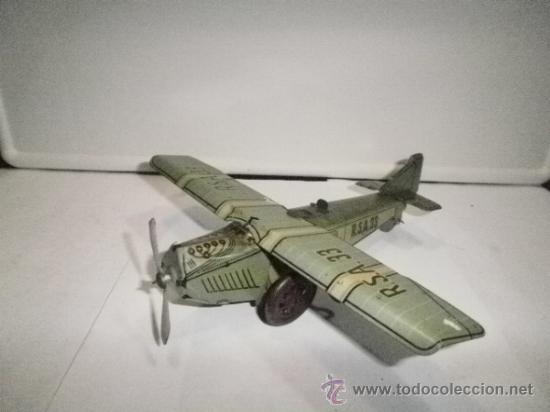 Juguetes antiguos de hojalata: AVION DE RICO - Foto 1