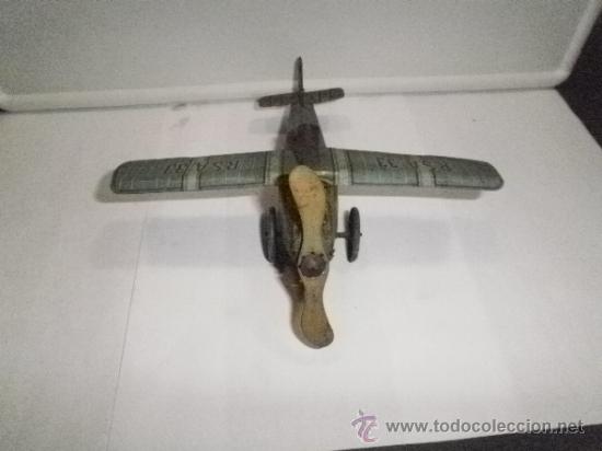 Juguetes antiguos de hojalata: AVION  DE RICO - Foto 2