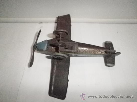 Juguetes antiguos de hojalata: AVION  DE RICO - Foto 4