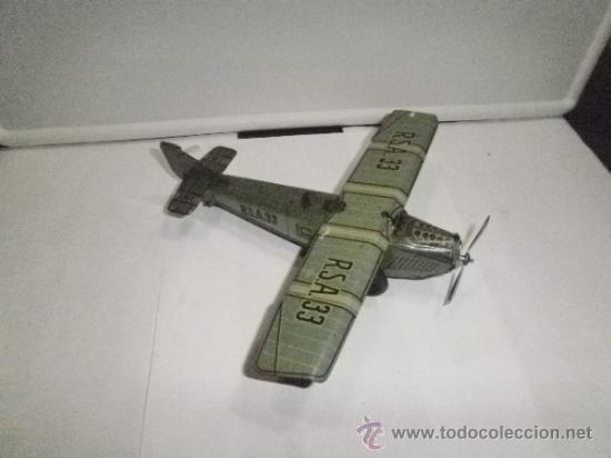 Juguetes antiguos de hojalata: AVION DE RICO - Foto 2