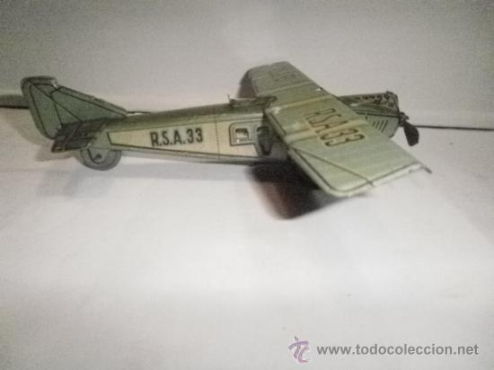 Juguetes antiguos de hojalata: AVION DE RICO - Foto 4