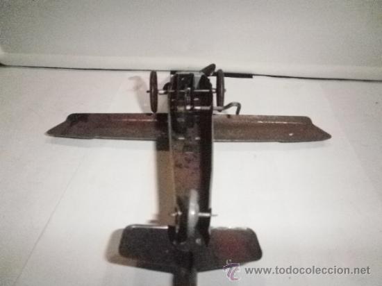 Juguetes antiguos de hojalata: AVION DE RICO - Foto 5