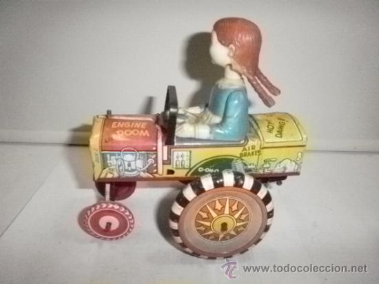 Juguetes antiguos de hojalata: CHICA CON COLETA - Foto 1