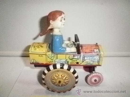 Juguetes antiguos de hojalata: CHICA CON COLETA - Foto 2