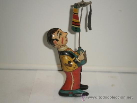 Juguetes antiguos de hojalata: MALABARISTA DE PAYA - Foto 3