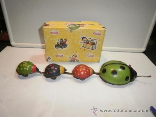 Juguetes antiguos de hojalata: MARIQUITAS  DE RICO - Foto 1