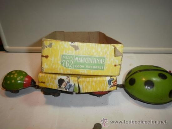 Juguetes antiguos de hojalata: MARIQUITAS  DE RICO - Foto 2