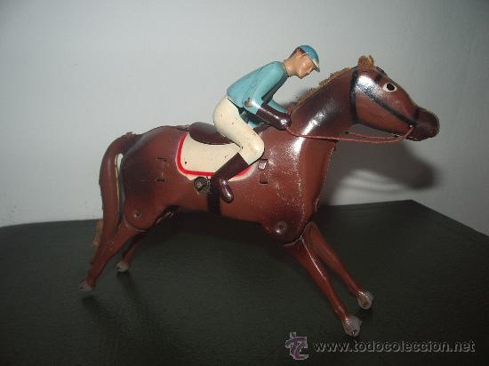 Juguetes antiguos de hojalata: JOCKEY de PAYA. - Foto 1