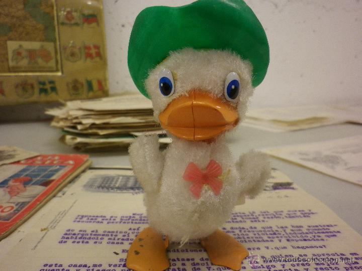 Juguetes antiguos de hojalata: El pato vaquero - Foto 1