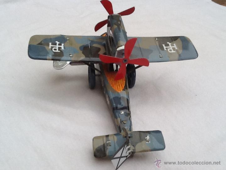 Juguetes antiguos de hojalata: Hidroavi&oacute;n de hojalata - Foto 5