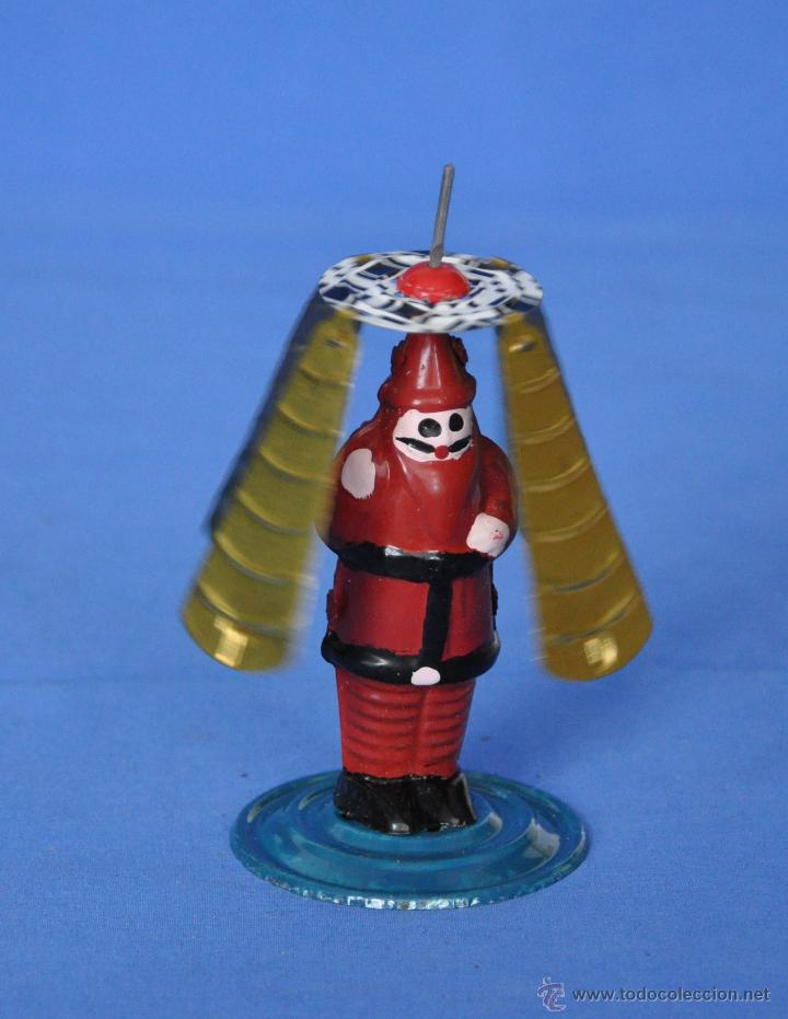 Juguetes antiguos de hojalata: Pap&aacute; Noel con autogiro. - Foto 1