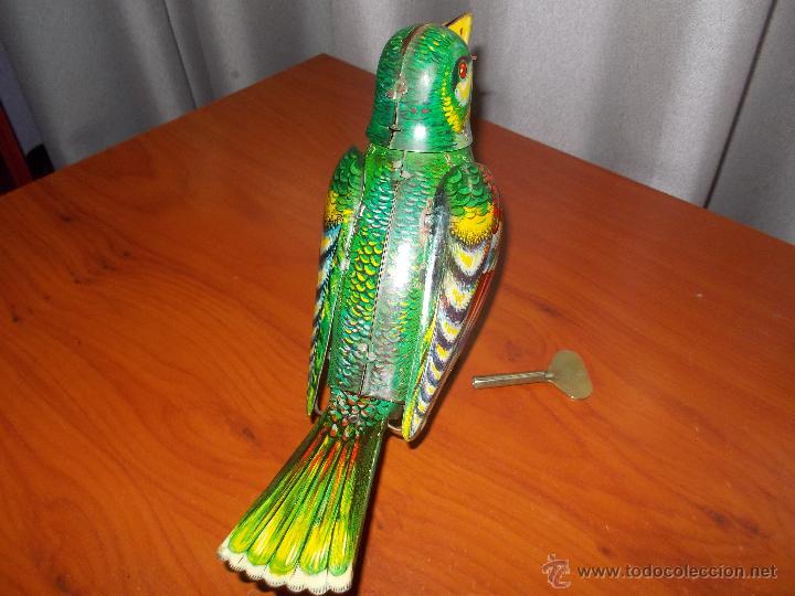 Juguetes antiguos de hojalata: Pajaro cantor de hojalata - Foto 19