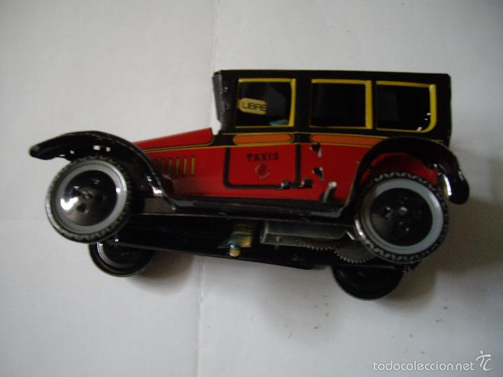 Juguetes antiguos de hojalata: TAXI DE PAYA - Foto 1