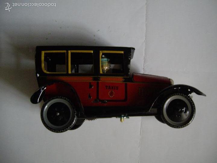 Juguetes antiguos de hojalata: TAXI DE PAYA - Foto 4