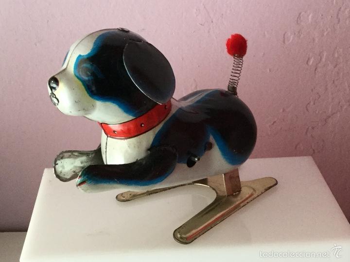 Juguetes antiguos de hojalata: Perrito saltar&iacute;n. Hojalata. NUEVO - Foto 1