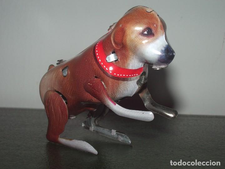 Juguetes antiguos de hojalata: PERRITO de HOJALATA. - Foto 1