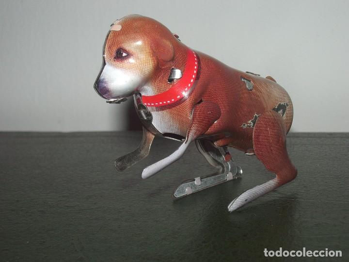 Juguetes antiguos de hojalata: PERRITO de HOJALATA. - Foto 3