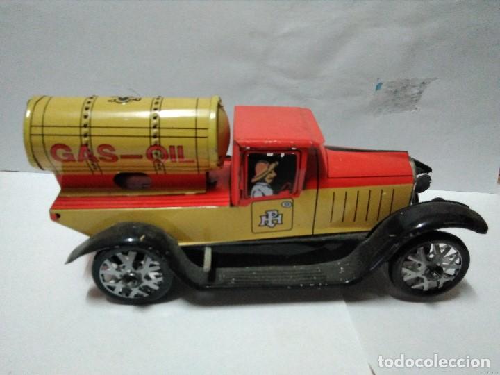 Juguetes antiguos de hojalata: Camion de hojalata funcionando con llave - Foto 1