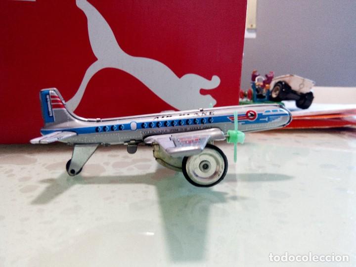 Juguetes antiguos de hojalata: avion de chapa - Foto 1