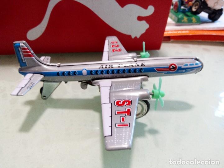 Juguetes antiguos de hojalata: avion de chapa - Foto 2