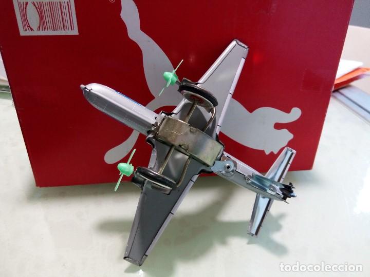 Juguetes antiguos de hojalata: avion de chapa - Foto 5