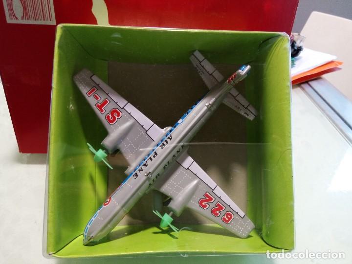 Juguetes antiguos de hojalata: avion de chapa - Foto 6