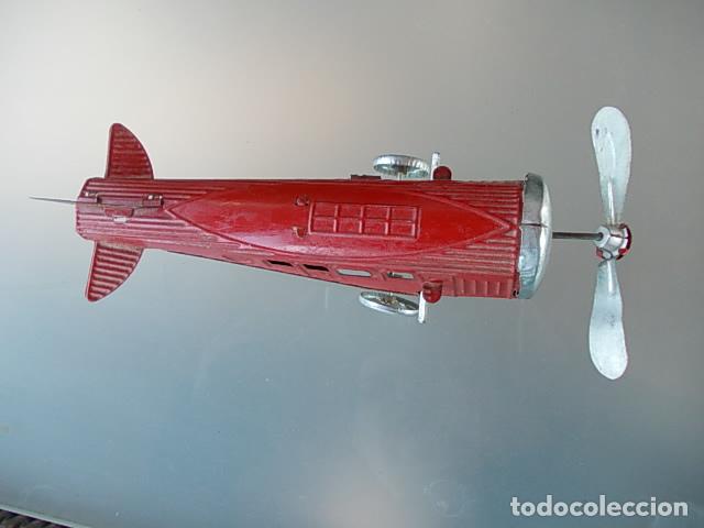 Juguetes antiguos de hojalata: Avi&oacute;n paya - Foto 1
