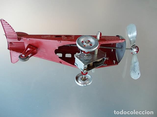 Juguetes antiguos de hojalata: Avi&oacute;n paya - Foto 2