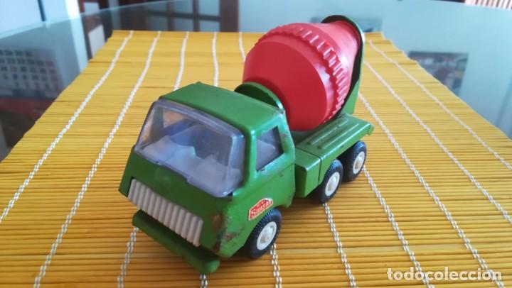 Juguetes antiguos de hojalata: Mini sanson hormigonera de Rico - Foto 1