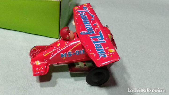 Juguetes antiguos de hojalata: Avi&oacute;n de chapa - Foto 3