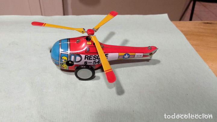 Juguetes antiguos de hojalata: Helic&oacute;ptero - Foto 1