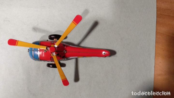 Juguetes antiguos de hojalata: Helic&oacute;ptero - Foto 2