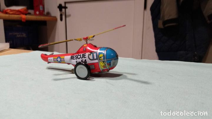 Juguetes antiguos de hojalata: Helic&oacute;ptero - Foto 3